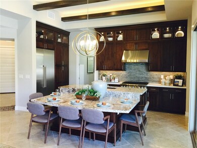 Photos are of the Gilmore model home kitchen and a