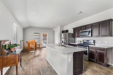 Galley style kitchen offers ample counter top spac