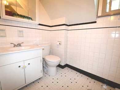 Full Bath. Full bath with new vanity top, medicine