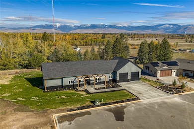 View from above of property featuring a mountain backdrop
