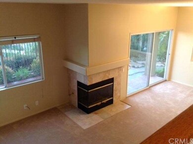 Open living & dining room taken from upstairs land