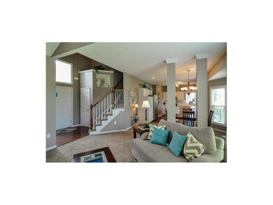 View from Great Room into Entryway & Kitchen!