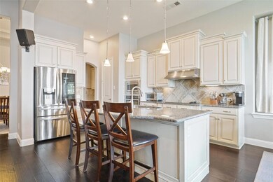 Kitchen featuring stainless steel appliances, ligh
