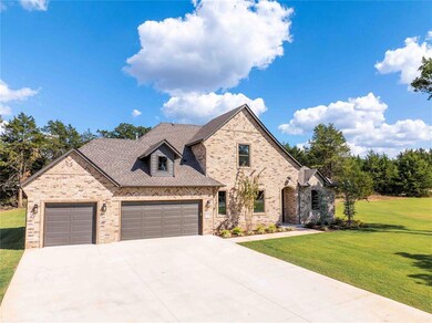View of front of property with a front lawn