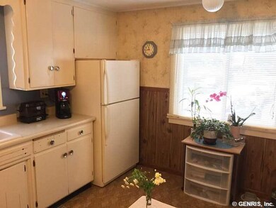 Kitchen Kitchen has replacement window overlooking