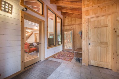 Huge mud room entrance w/large locking closet.