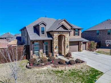 Fantastic curb appeal, arched stone entryway and t