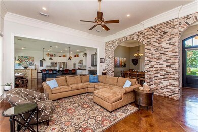 Beautiful, custom brick arches define the living s