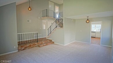 Living room & dining room which is right off the kitchen