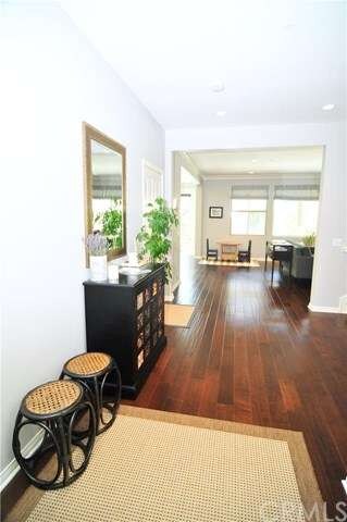 entry with beautiful hardwood floors