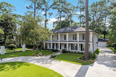 Private gates and a freshly poured circular drivew