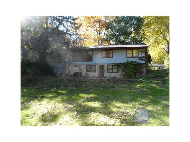 Exterior Back. Walkout lower level with patio area