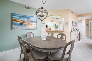 Dining space featuring light tile patterned floors