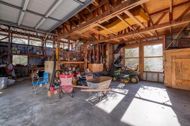 Garage featuring a workshop area