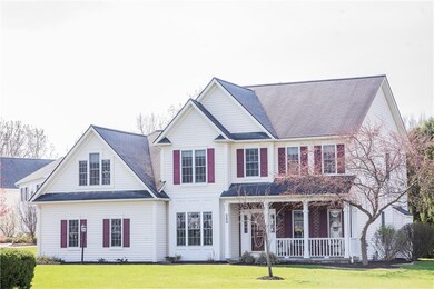 COVERED FRONT PORCH & DECORATIVE FRONT DOOR ADDS T