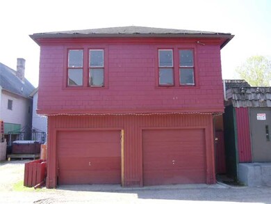Exterior Front. 4th unit and 2 car garage