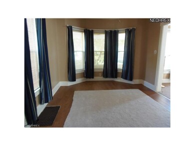 Formal dining room off of living room and kitchen.