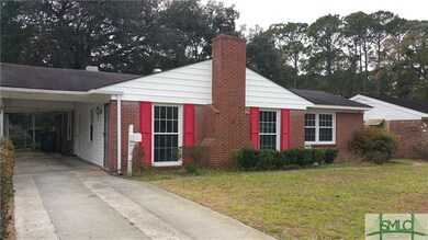 FRONT EXTERIOR WITH 2 CAR CARPORT