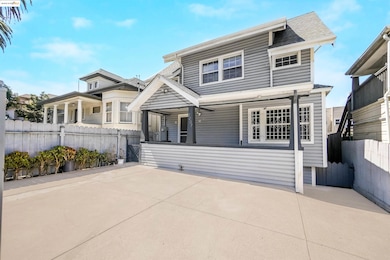 View of front facade with a porch and a shingled roof