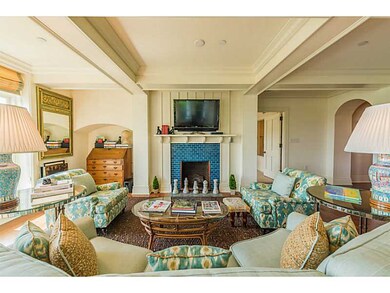 Living Room. Having a cozy fireplace makes this su