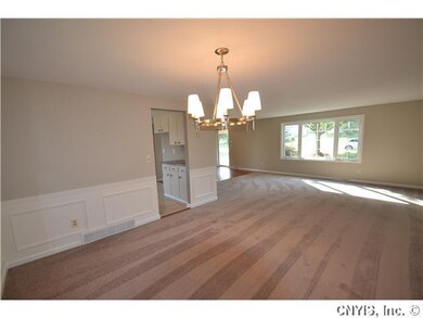 Living Room. The sun shines brightly through this 