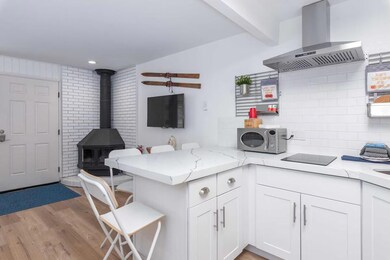 2 - 207 Kitchen Fireplace.jpg