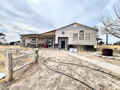 View of front of property featuring stucco siding