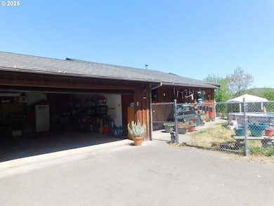 231 NE Darrell Ave, Winston, OR 97496 - photo 2