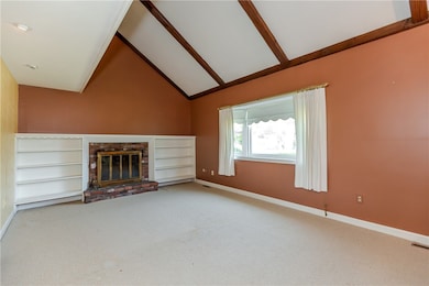 Living room with vaulted ceilings