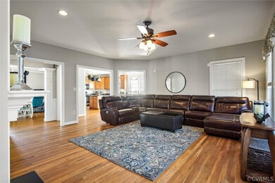 Family room leading to the kitchen and dining room