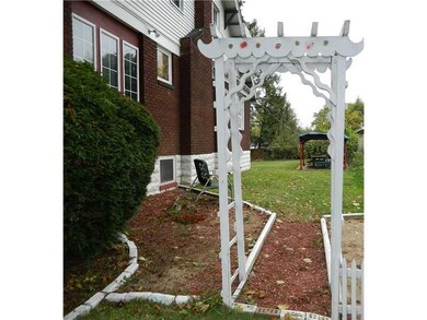 Land/Lot. Right side of Home; Arbor and pathway to
