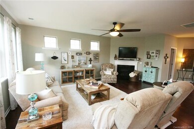 Large family room with plenty of natural light.