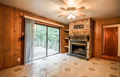 Unfurnished living room with crown molding, ceilin