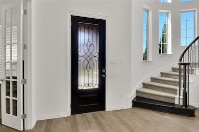 Office to left of front door.