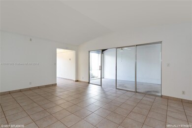Living Room with large covered screened in patio