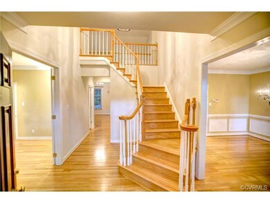 Open foyer with hardwood floors