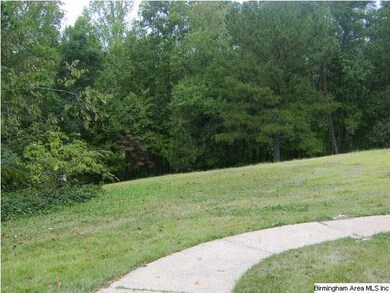 View of front yard and woods