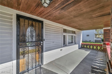 Entrance to property with a porch