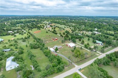 10 Acres! 1900 sq ft home, 2 car detached garage, 
