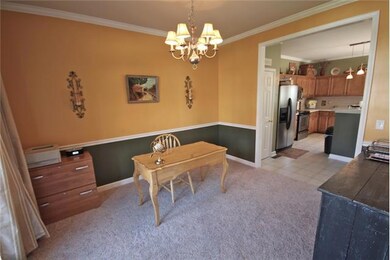 Formal Dining Room (Currently used as Office) with private entrance to covered front porch.