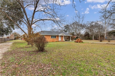 View of front of property featuring a front lawn