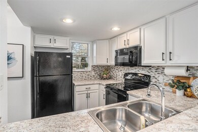 7210 Devinney Ct unit C, Arvada, CO 80005 - photo 2