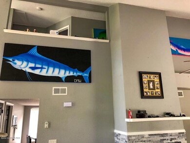 Cathedral ceiling open to second