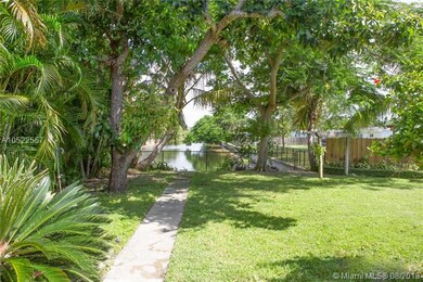 The spacious backyard has a beautiful canal view! 