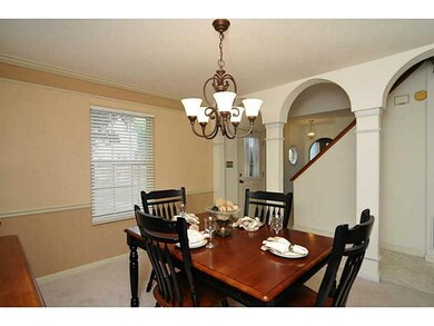 Dining Room. Beautiful arched columns accent forma