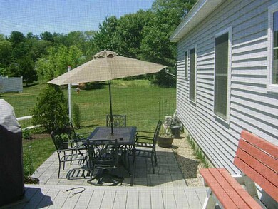 Exterior Back. Screened porch leads...