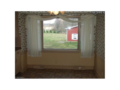 Eating Area with large bay window, lets in plenty 