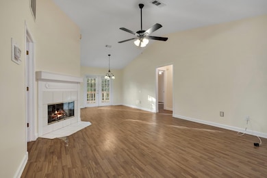 This home Living room opens to the Dining Room wit