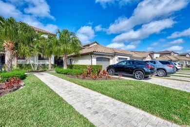 Garages sit in front of the veranda buildings.
