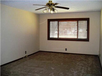 Open and bright family room with beautiful window